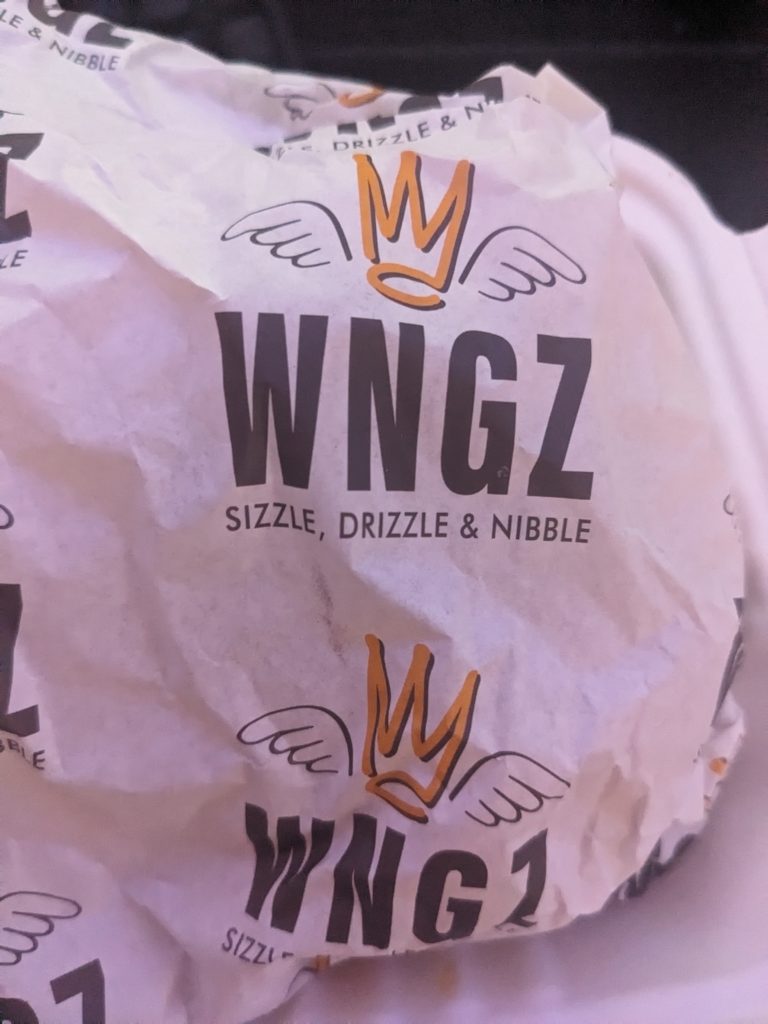 The wrapping for a wingz burger