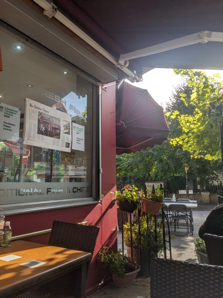 Outdoor seating of The Golden Chippy